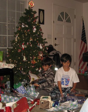 Boys opening gifts